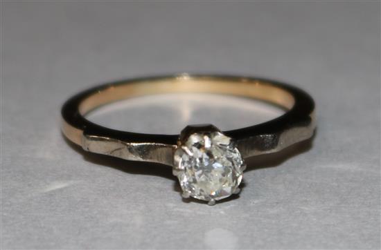 A gold and solitaire diamond ring, size O.